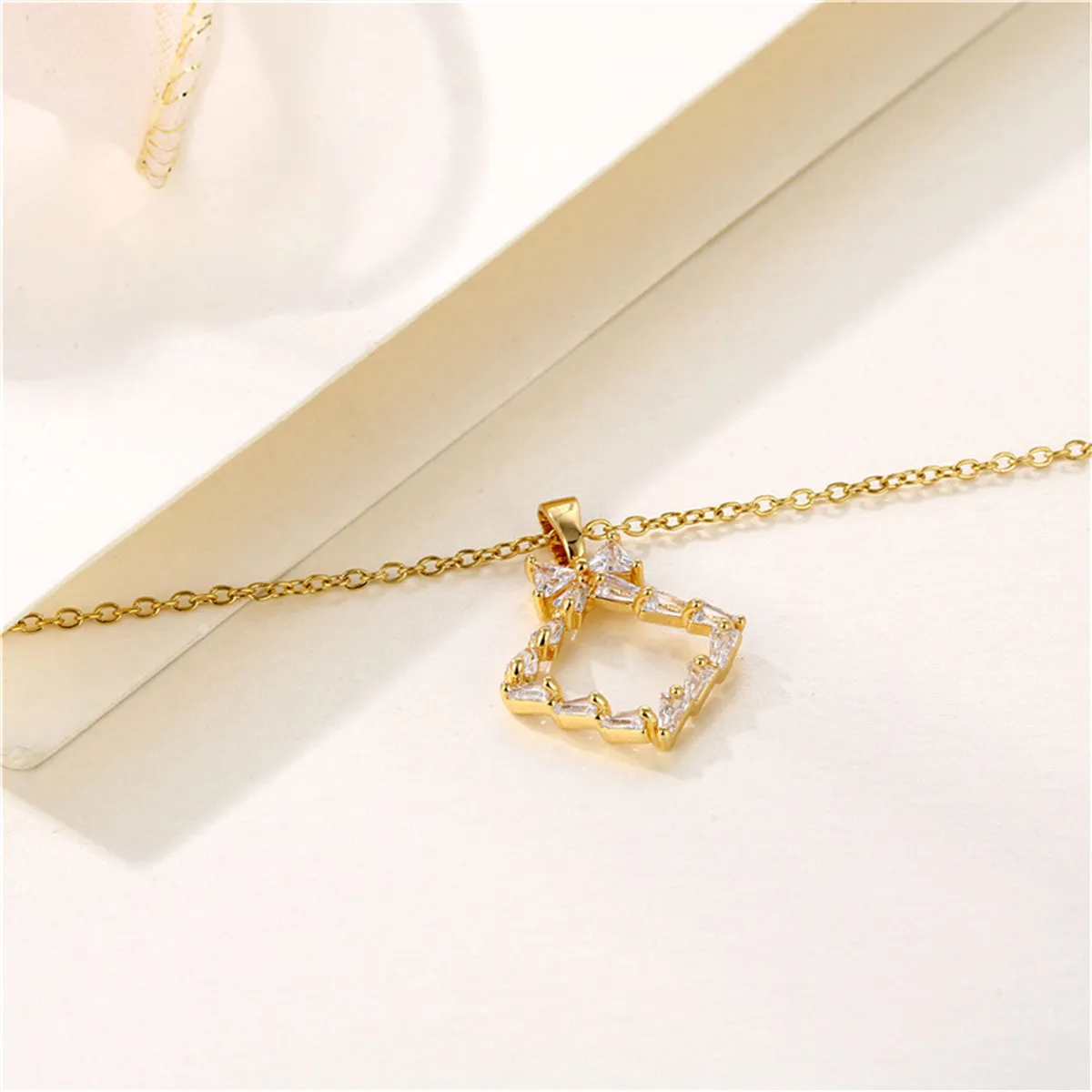 Crystal & 18K Gold-Plated Bow Rhombus Pendant Necklace