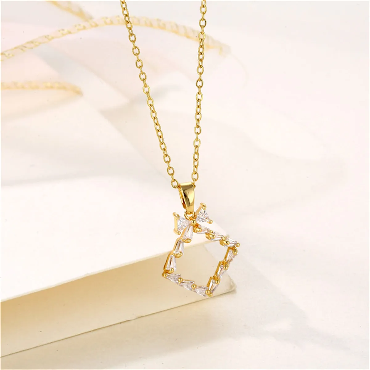 Crystal & 18K Gold-Plated Bow Rhombus Pendant Necklace