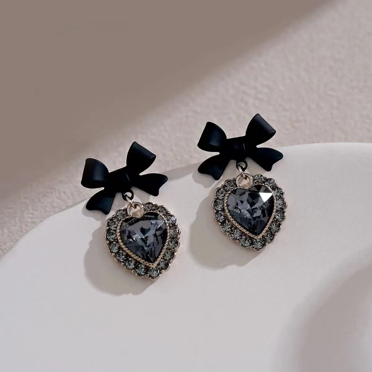 Cubic Zirconia & Black Crystal Bow Heart Drop Earrings