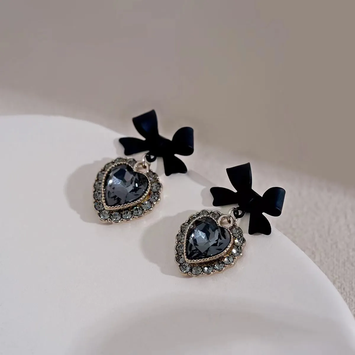 Cubic Zirconia & Black Crystal Bow Heart Drop Earrings