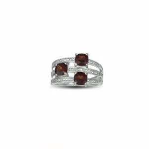 Garnet and Diamond Accent Ring in Sterling Silver