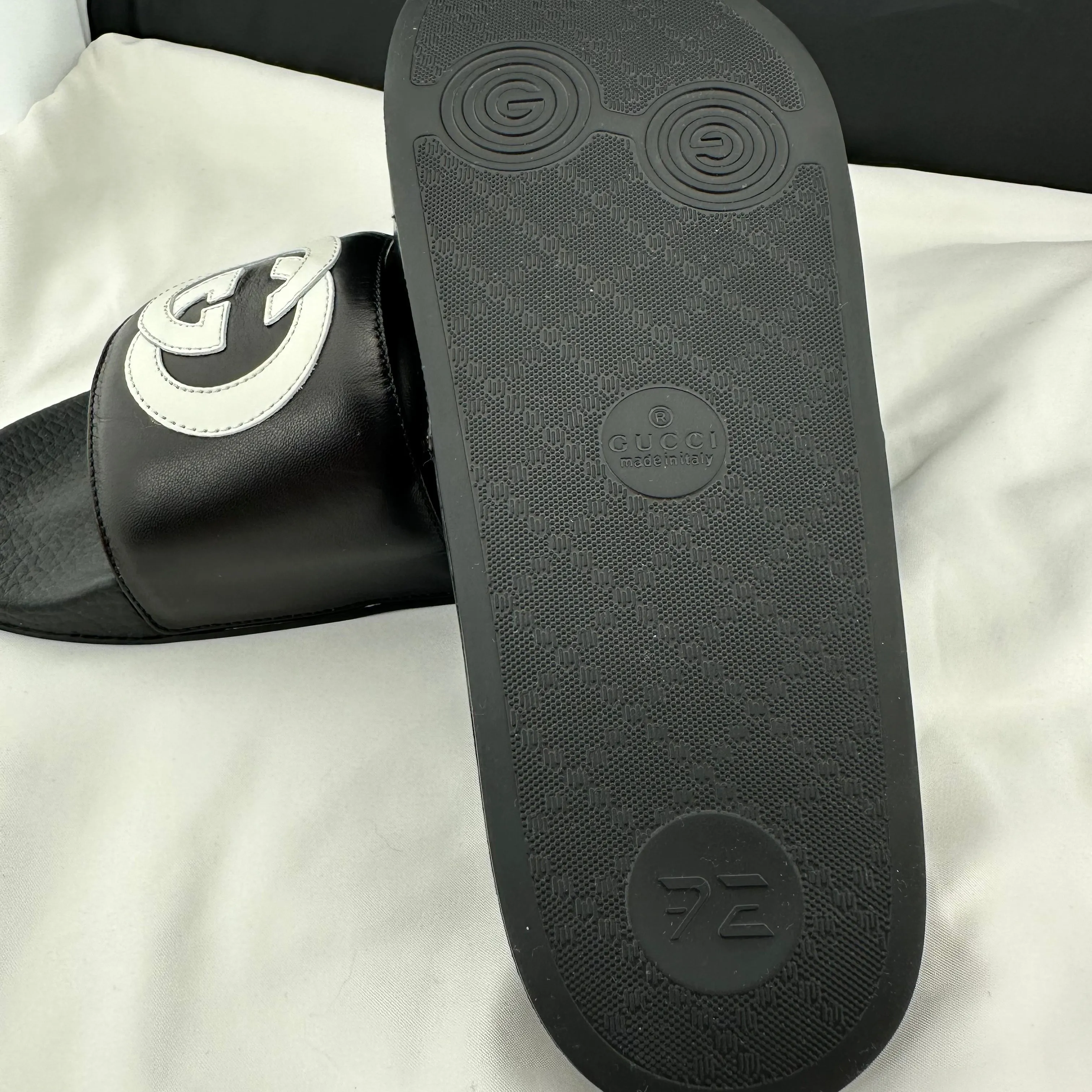 Gucci Men's Black Slides with White Interlocking GG