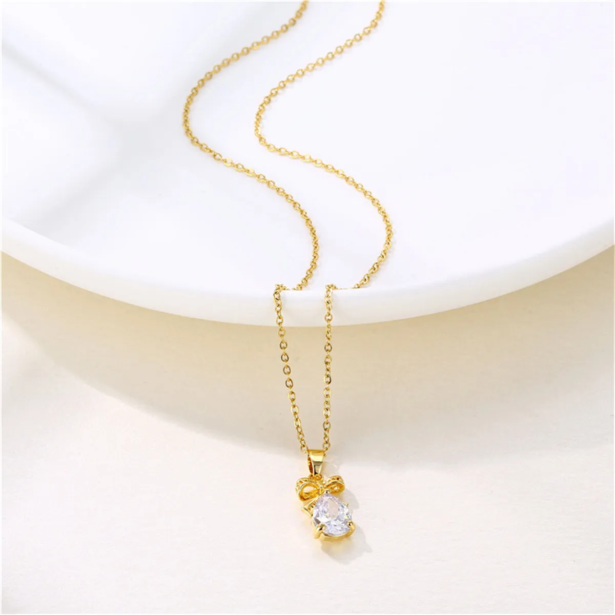 Pear-Cut Crystal & 18K Gold-Plated Bow Pendant Necklace