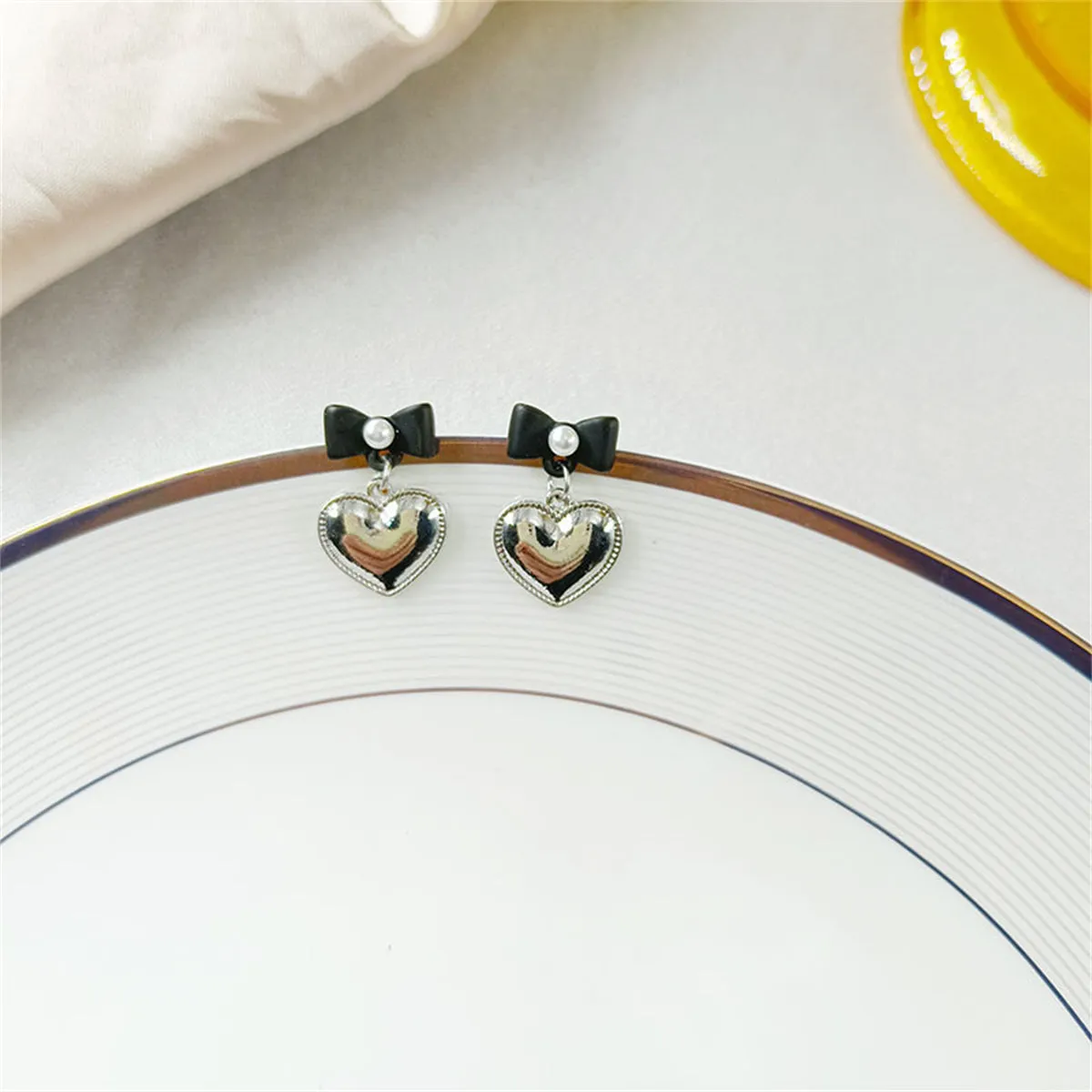 Pearl & Black Enamel Silver-Plated Bow Heart Drop Earrings