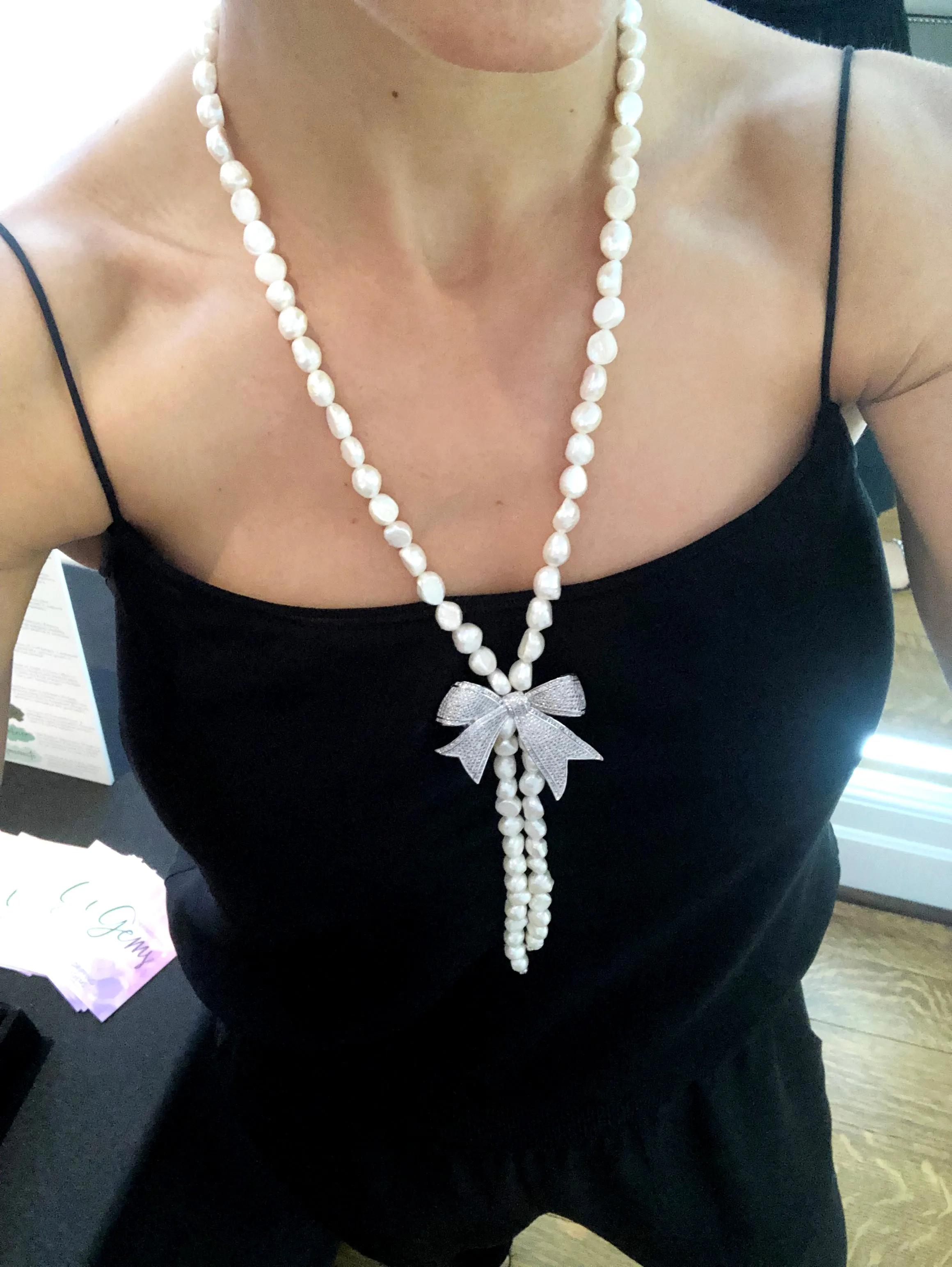 Pearl Necklace with Large Silver Pave Bow