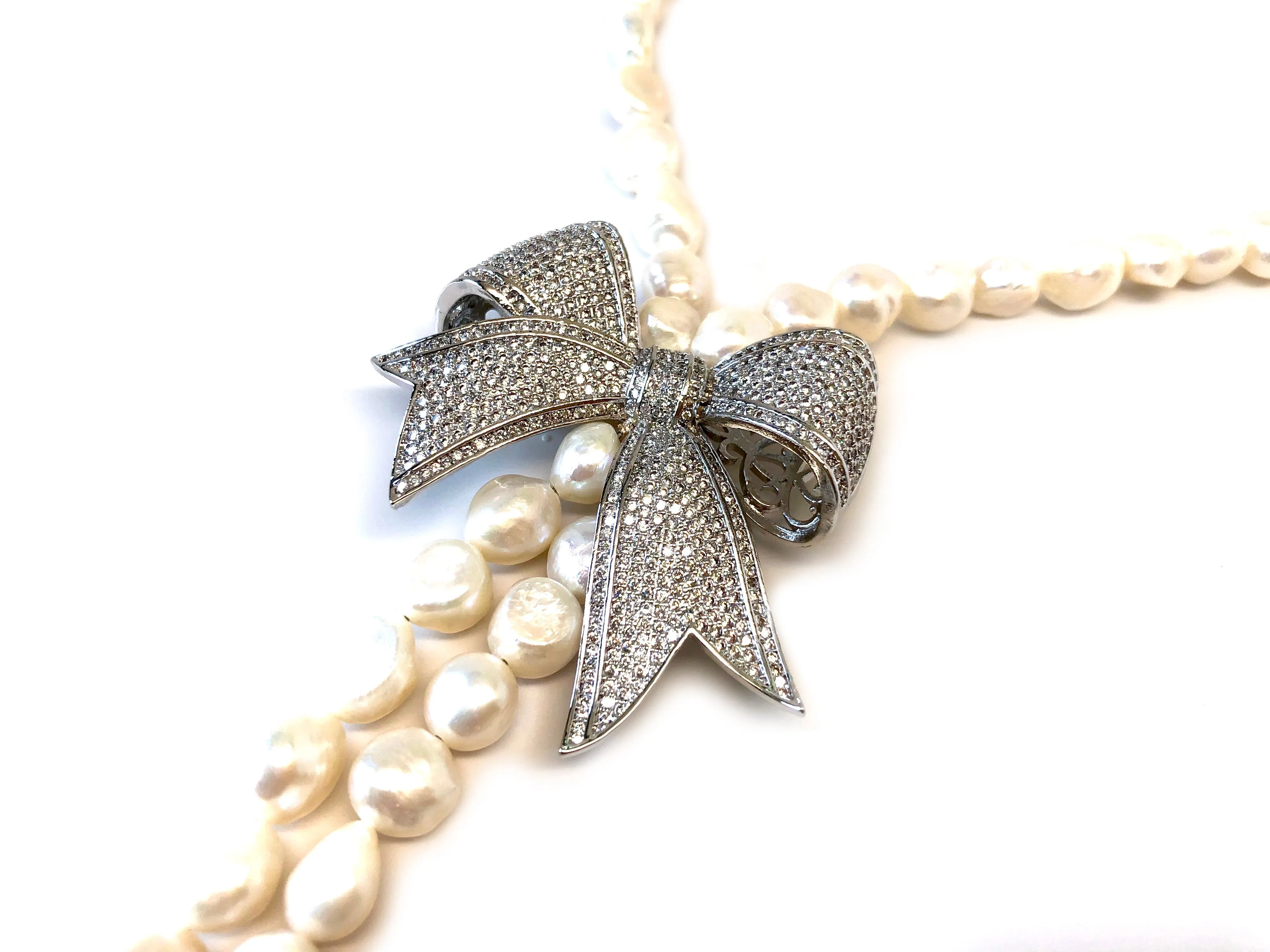 Pearl Necklace with Large Silver Pave Bow