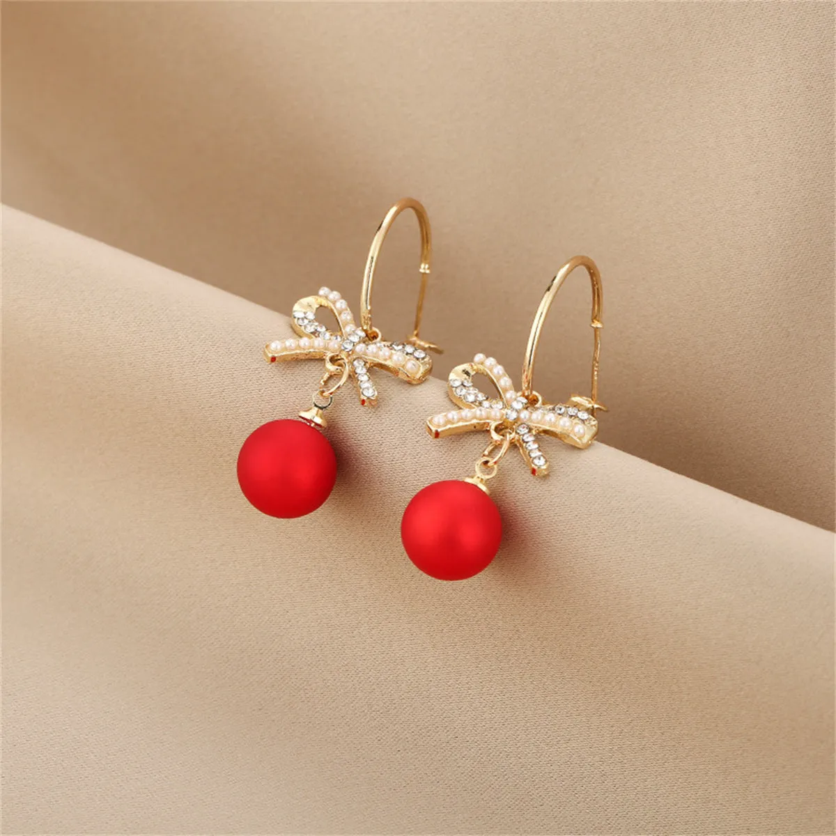 Red Resin & Pearl Cubic Zirconia Bow Huggie Earrings