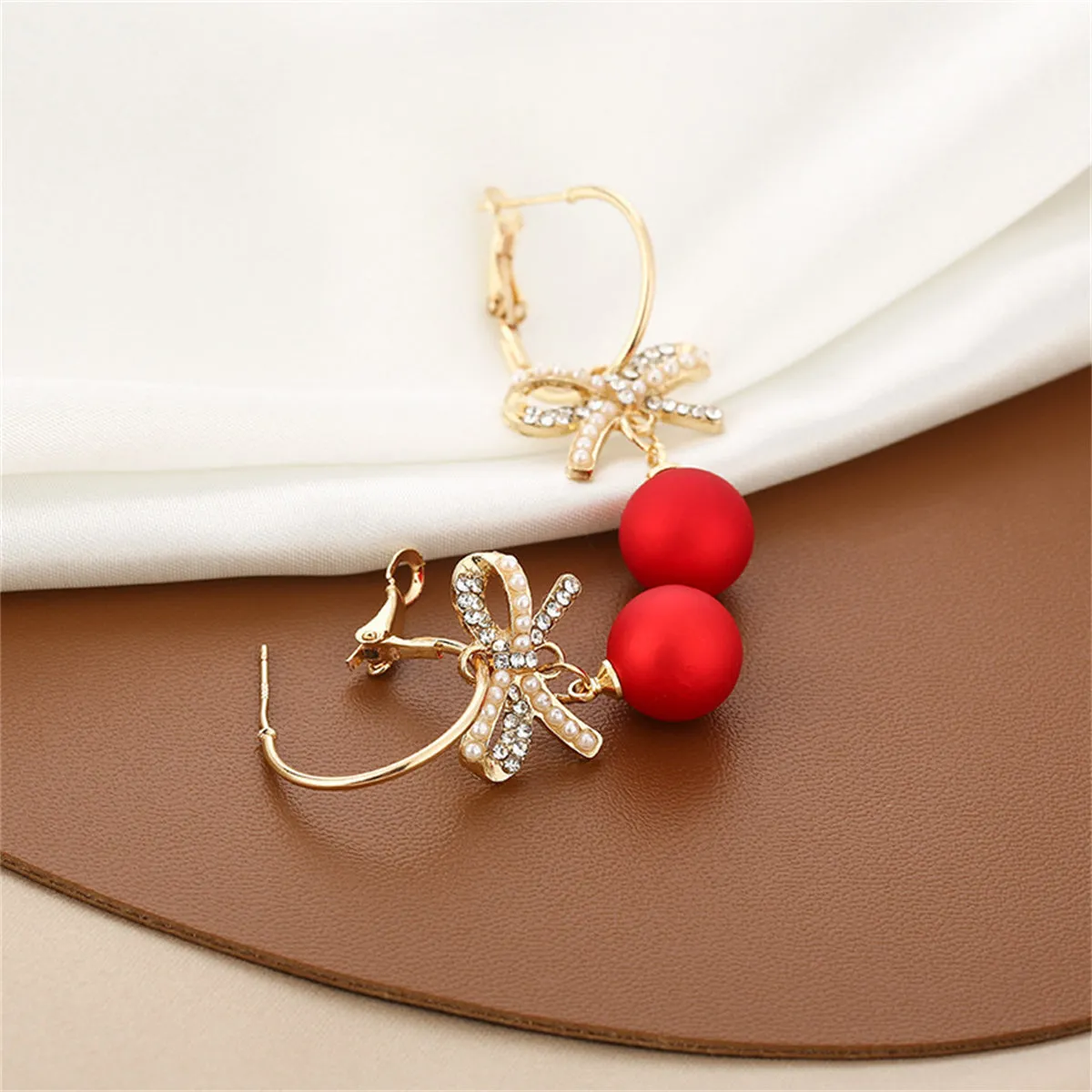 Red Resin & Pearl Cubic Zirconia Bow Huggie Earrings