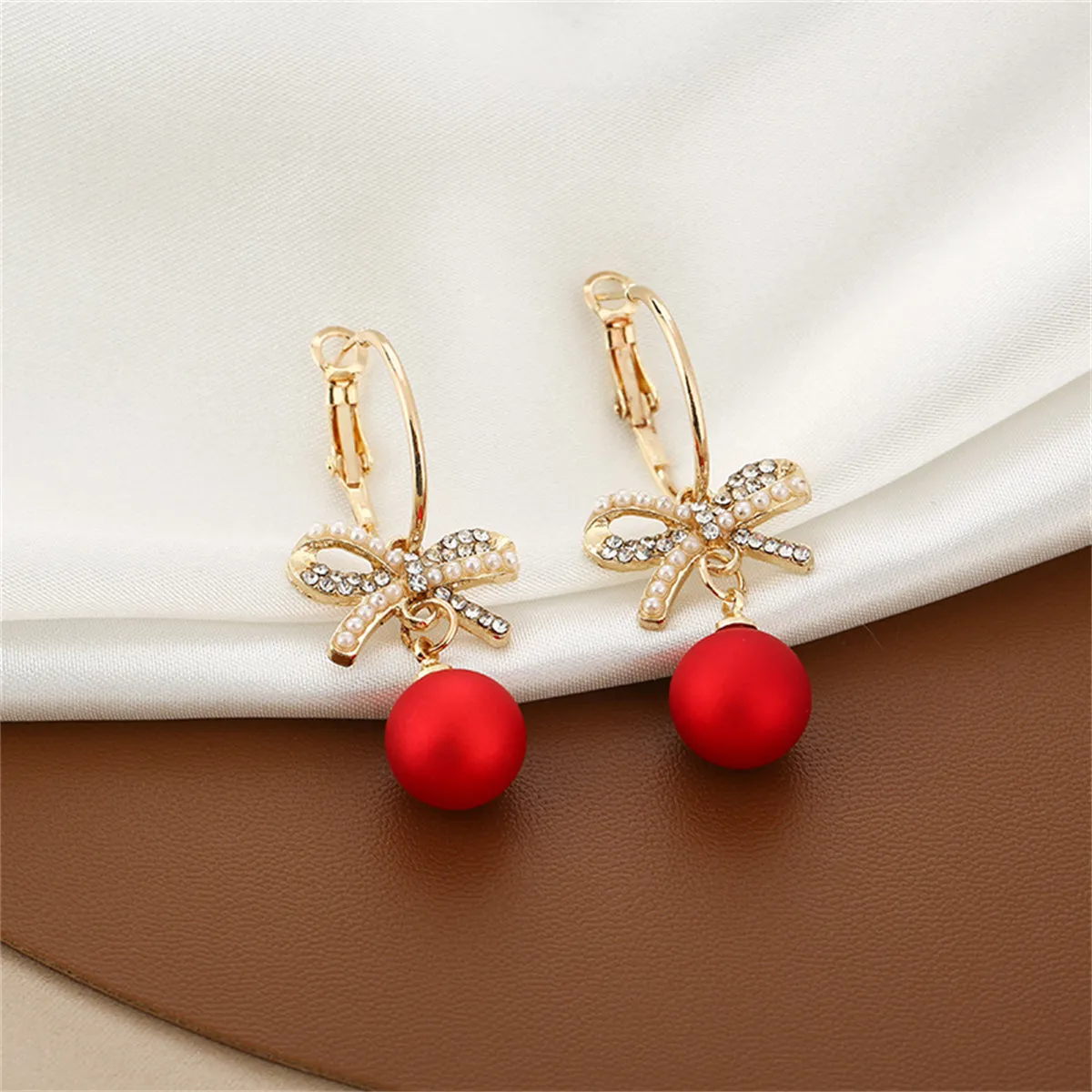 Red Resin & Pearl Cubic Zirconia Bow Huggie Earrings