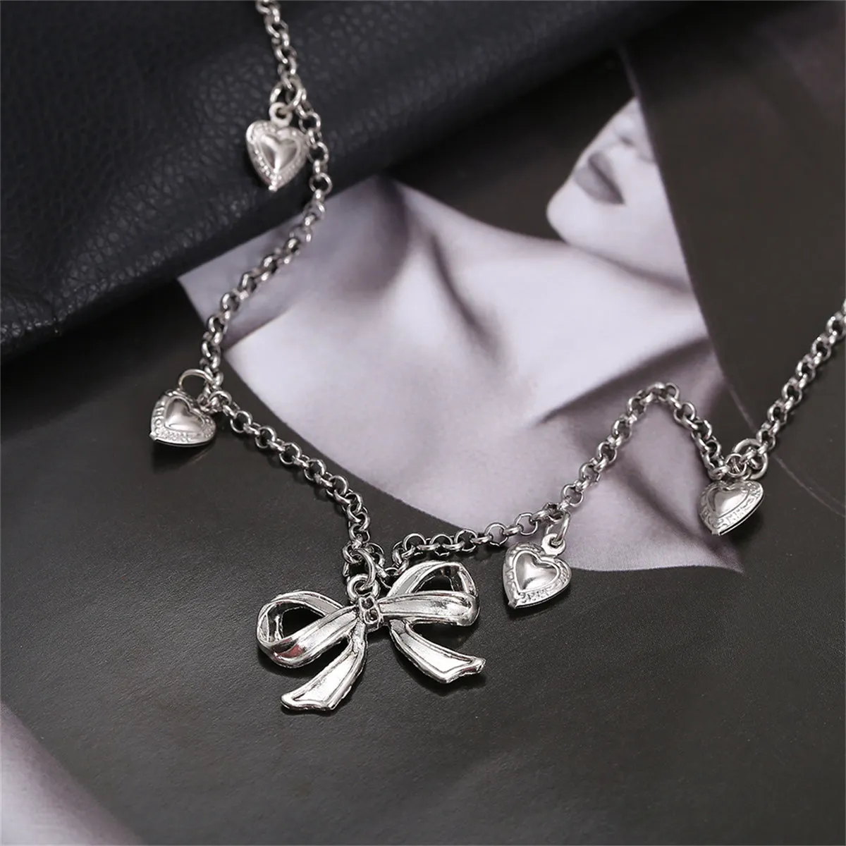 Silver-Plated Bow Heart Station Necklace