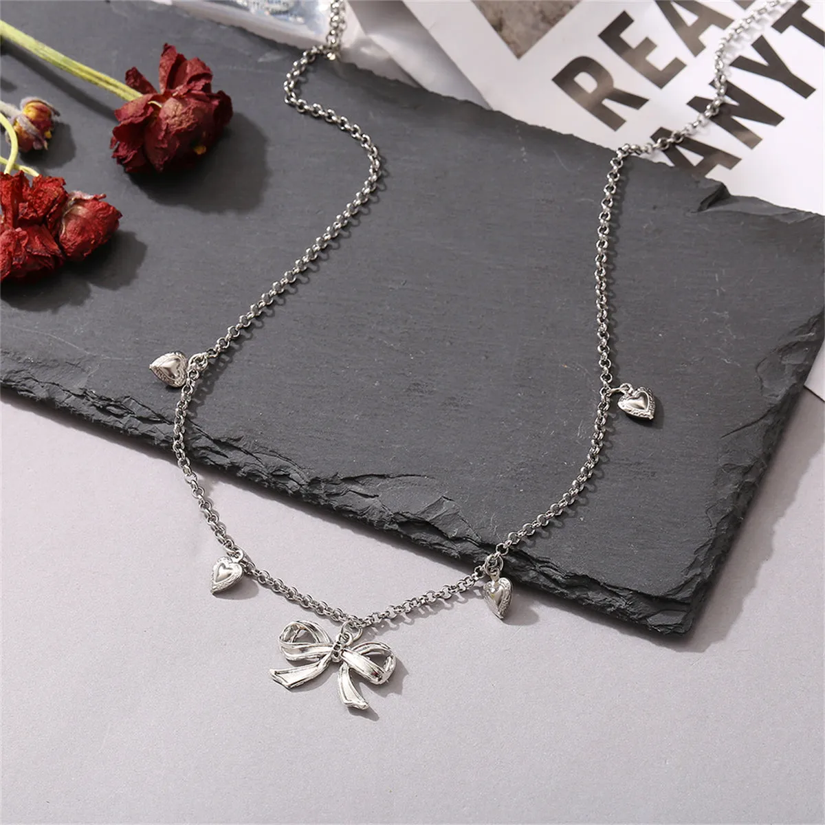 Silver-Plated Bow Heart Station Necklace