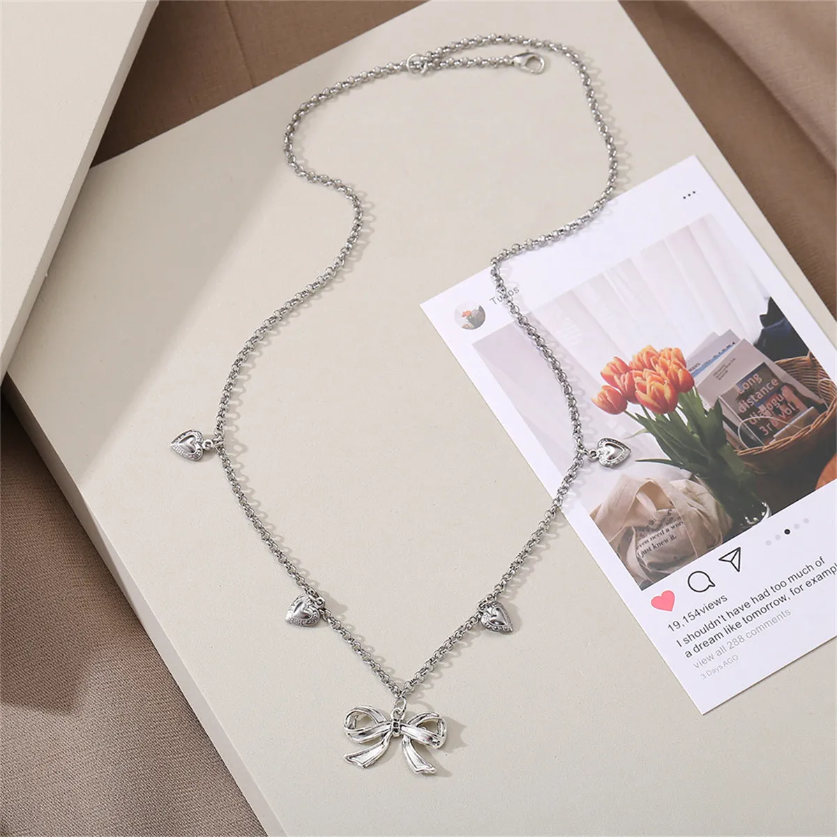 Silver-Plated Bow Heart Station Necklace
