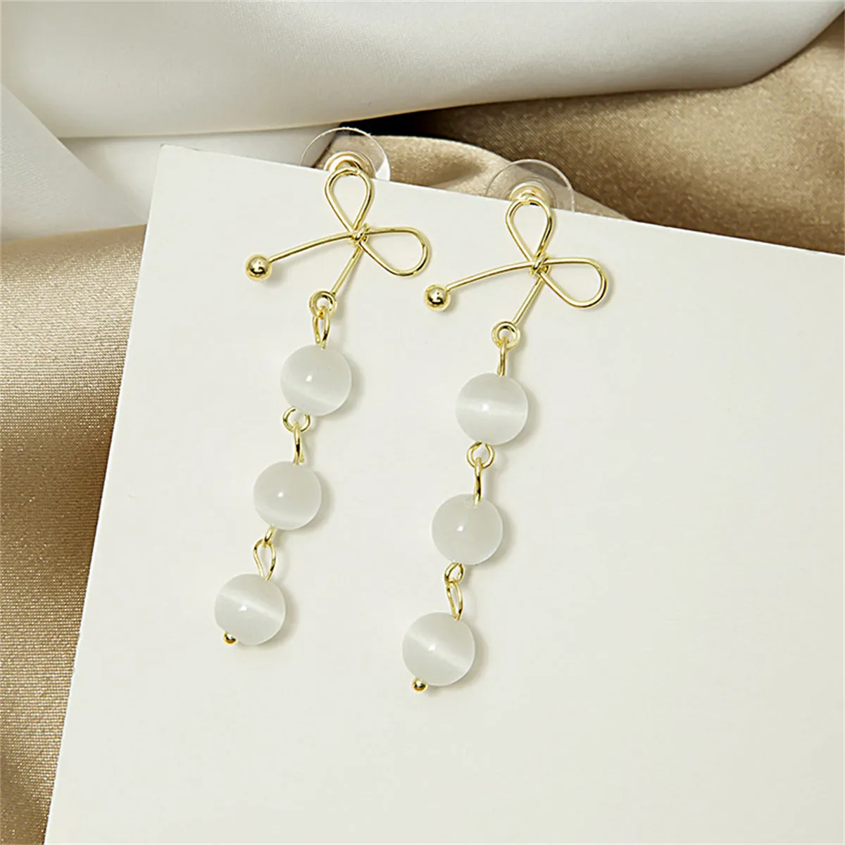 White Cat-Eye & 18K Gold-Plated Bow Triple Tier Round Drop Earrings